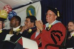 Peter Smith Clapping at Graduation Ceremony