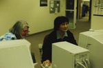 Employees Working at Computer