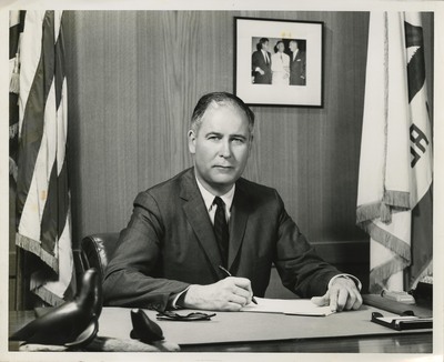 Photograph of Fred Farr at his desk