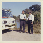 Fred Farr Shaking Hands With an Unidentified Man