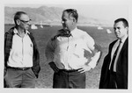 Fred Farr Speaking With Two Men on a Dock