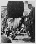 Lady Bird Johnson Reaching Out to Shake Hands With a Young Girl Dressed in a Butterfly Costume