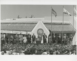 Bill Clinton, Sam Farr, Leon Panetta, and Other Officials Stand for the National Anthem at the CSUMB Inauguration Ceremony by Greg Pio